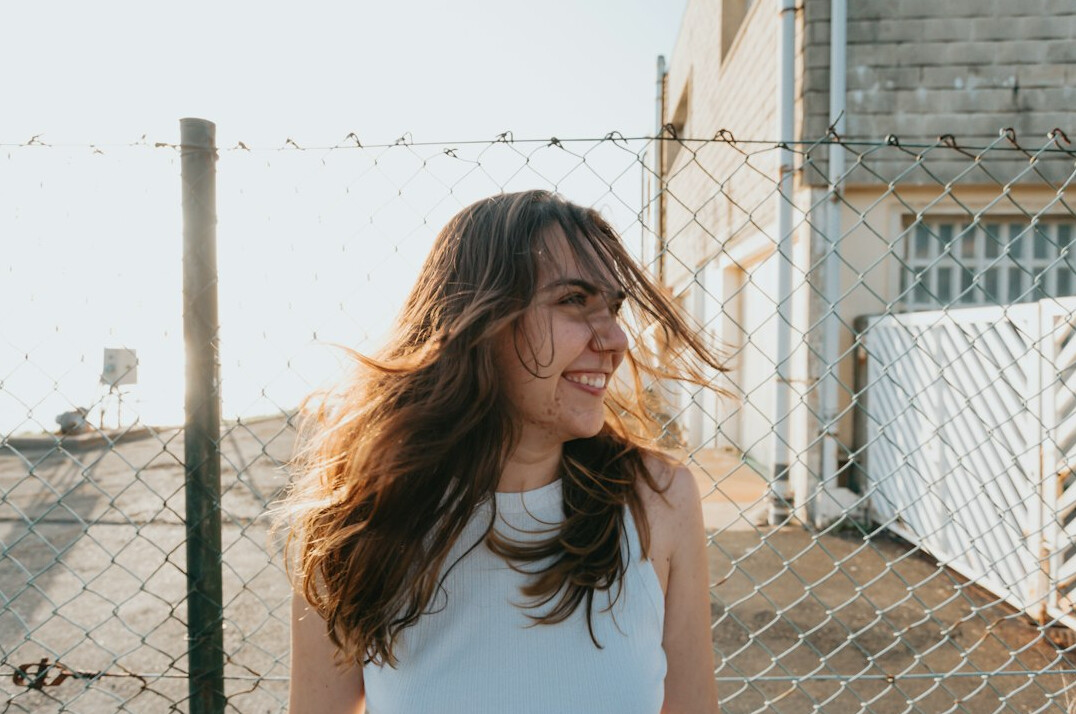 Portrait of a smiling woman with brown hair