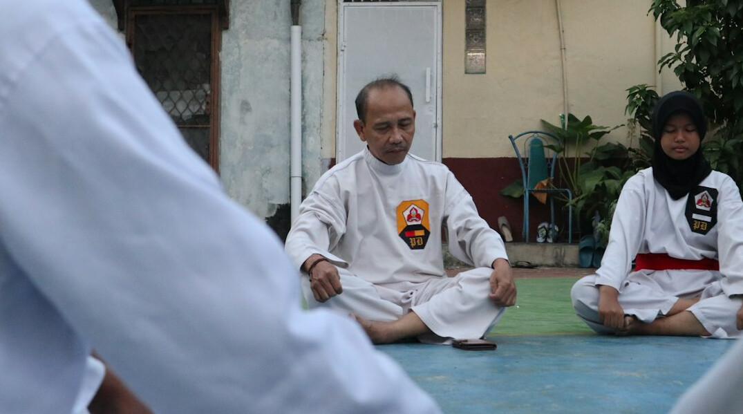 participants doing breathing exercises