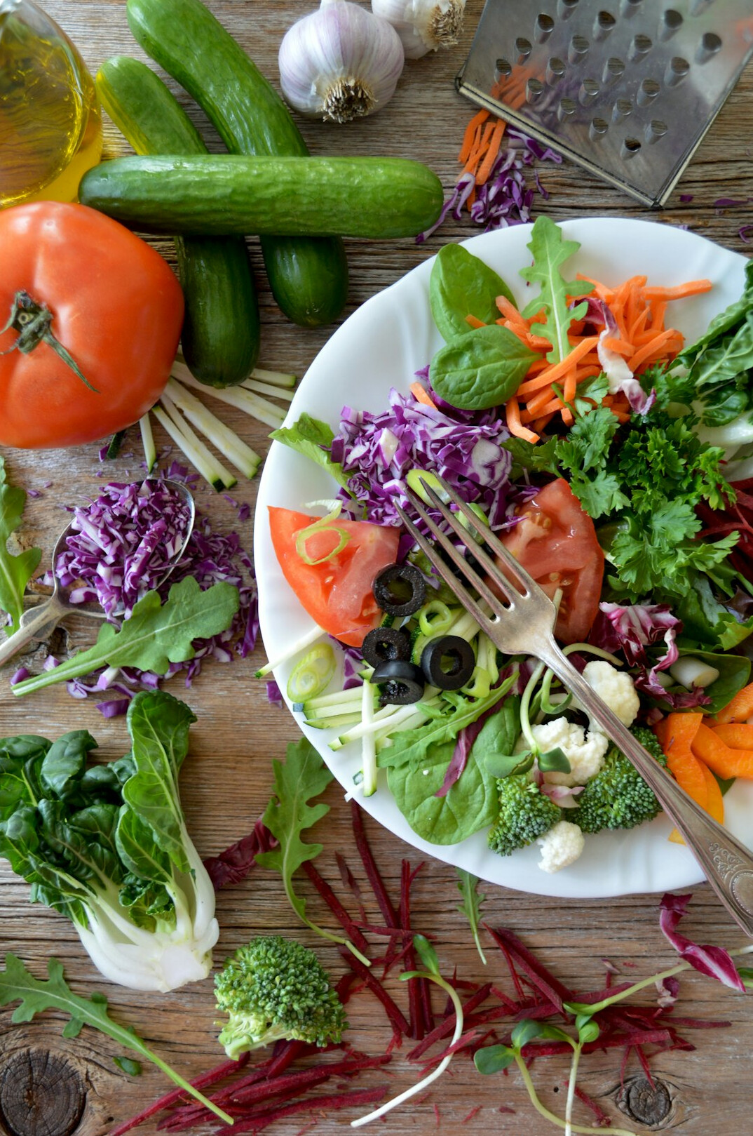Fresh vegetables and healthy ingredients arranged on a table